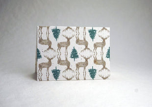 Card with deer and tree pattern on a white background