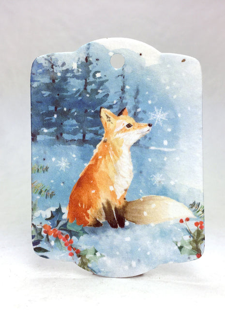 Seed Paper tag with a fox design on a snowy background