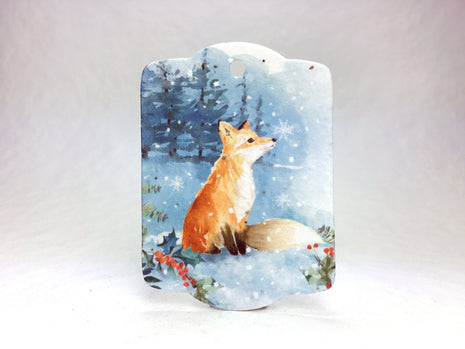 Seed Paper tag with a fox design on a snowy background