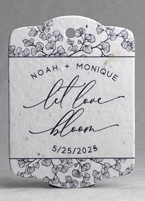 Personalized wedding favor tag with floral design and text on a whitebackground